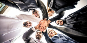 Sales Team Putting Hands Together