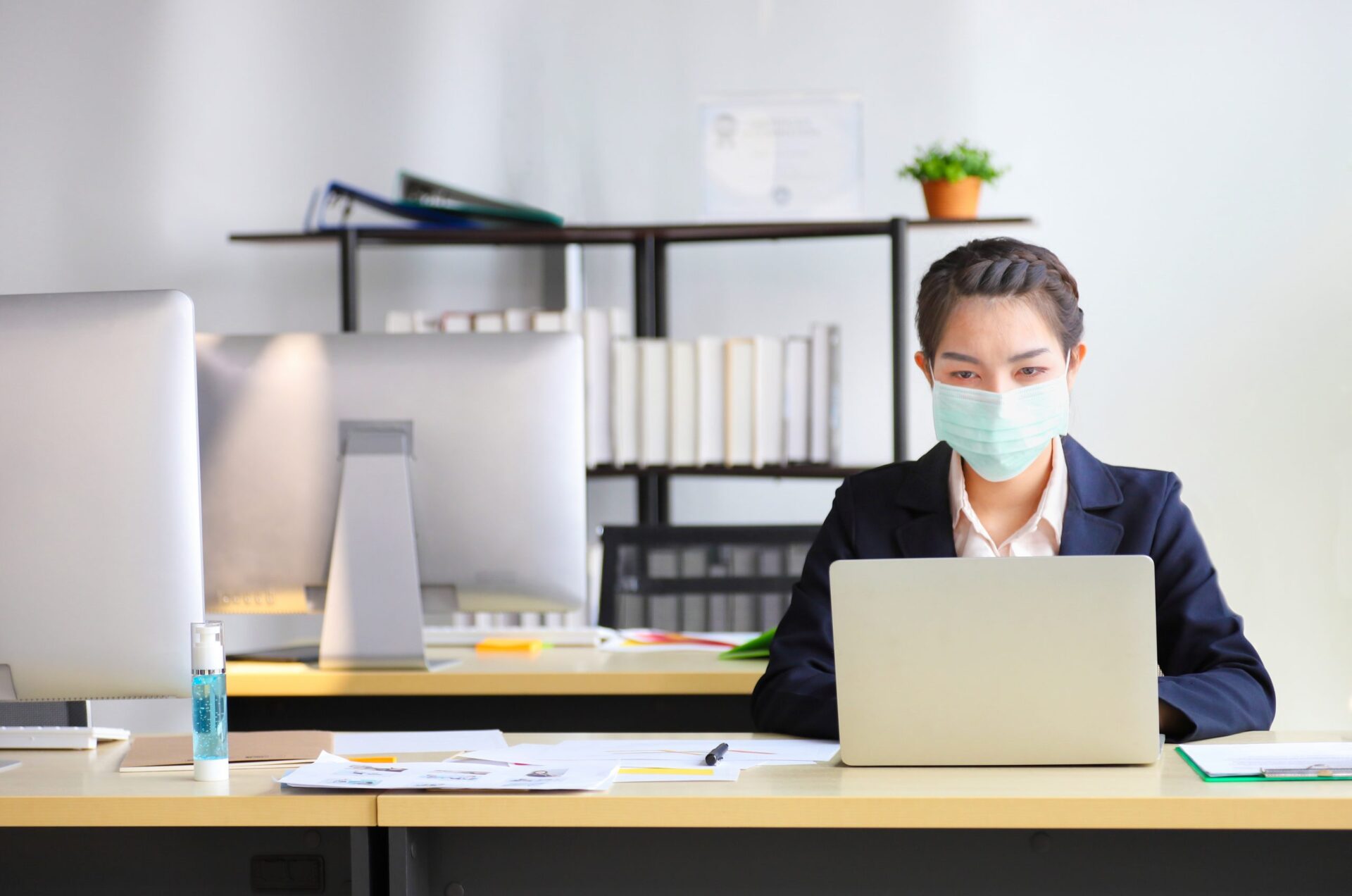 Woman Working in a Mask