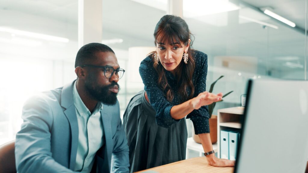 Advice, meeting and business people in office with computer, finance or investment for project. Problem solving, discussion and financial manager with employee for career development and help.