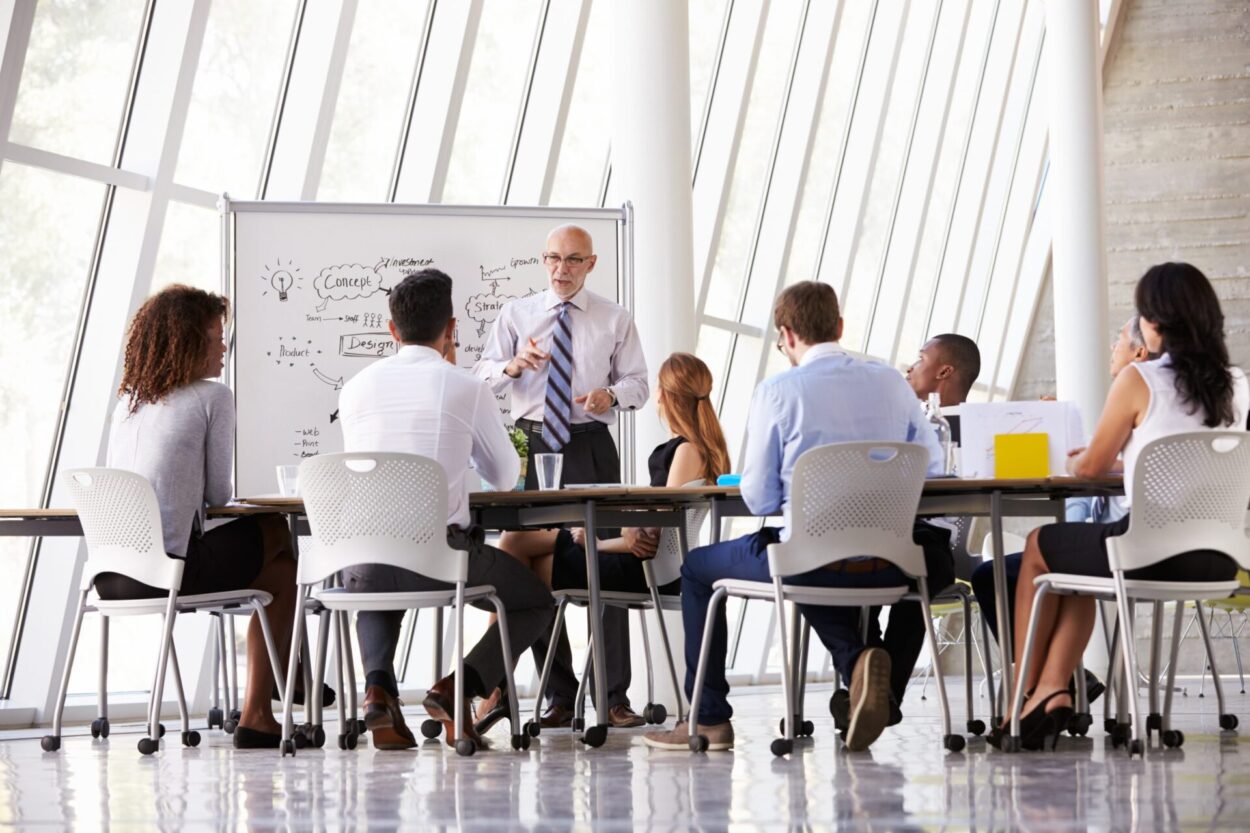 Businessman leading a sales training session