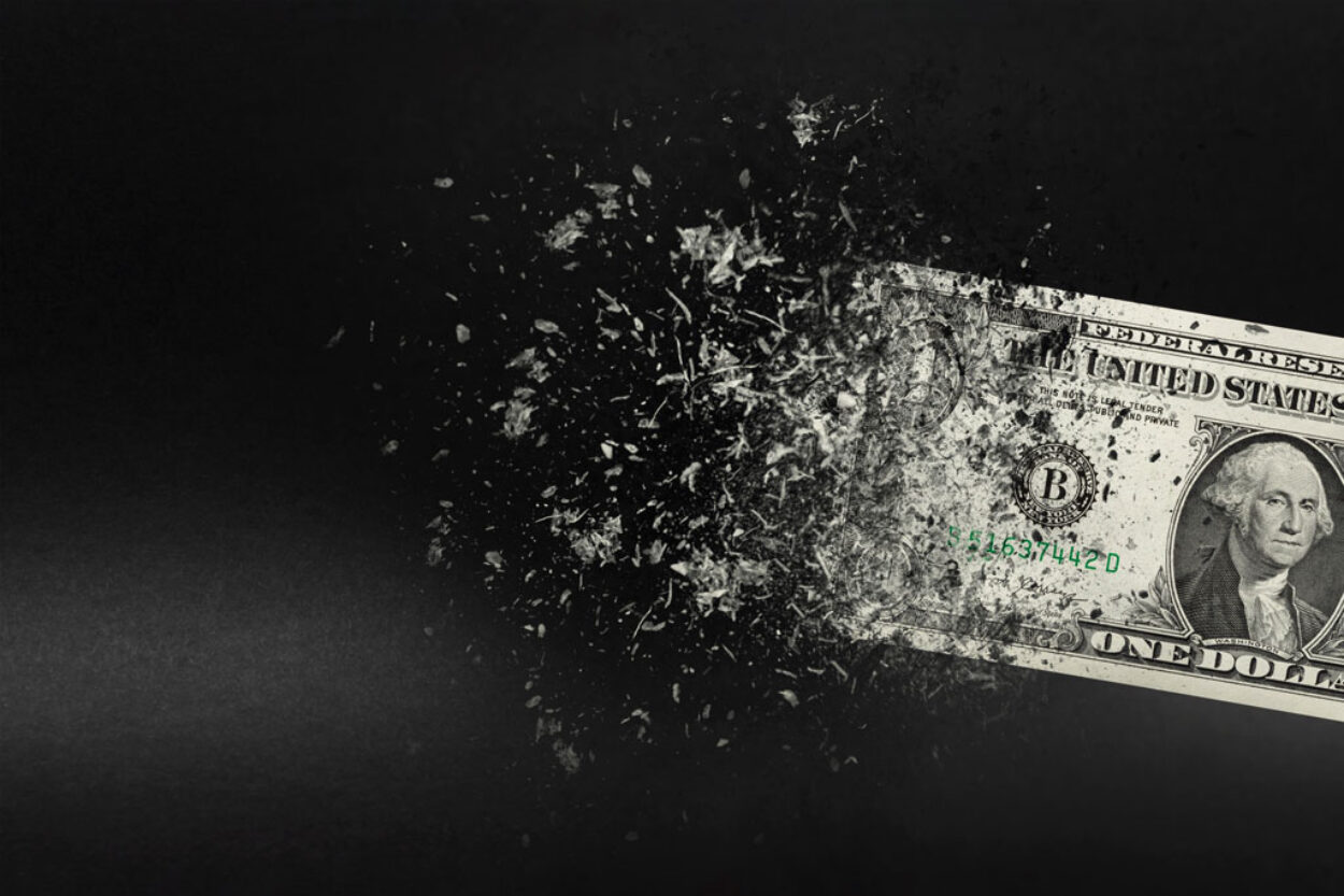 : One dollar bill disintegrating due to inflation on small businesses