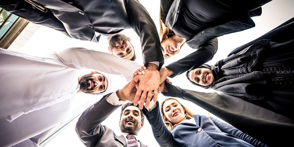 Sales Team Putting Hands Together